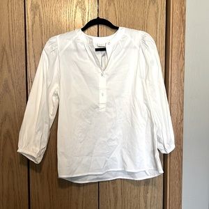 A New Day- White quarter button peplum top. NWT